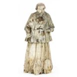 A carved wood and painted figure of a saint,