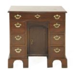 A George III mahogany kneehole desk