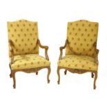 A pair of French beech armchairs,