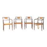 A set of four Sheraton mahogany armchairs,