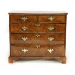 A Queen Anne figured walnut chest