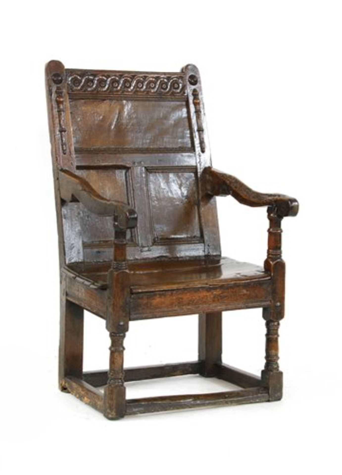 An oak panel back open armchair