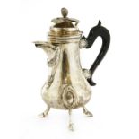 A silver hot water pot,