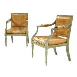 A pair of blue painted armchairs,