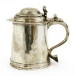 A Queen Anne silver tankard,