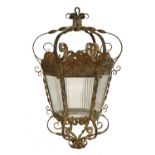 A large wrought iron hexagonal lantern,