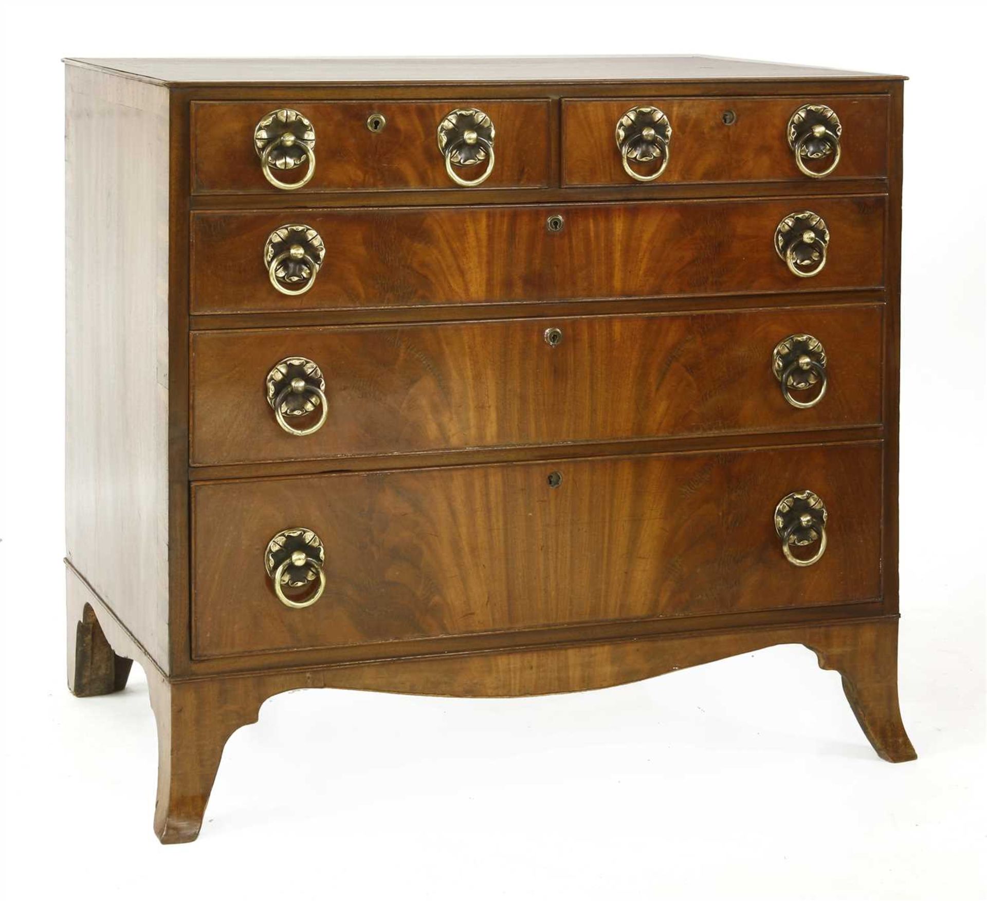 A George III and later flame mahogany chest of drawers