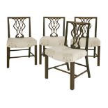 A set of four George III Chippendale-style mahogany dining chairs