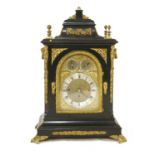 An ebonised musical bracket clock