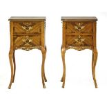 A pair of Louis XVI-style cabinets