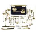 A collection of silver flatware