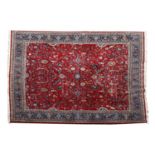 A red ground woollen Kadjar carpet
