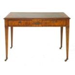 A continental walnut writing table