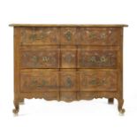 A French walnut serpentine front commode,
