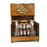 A Continental burr wood and inlaid decanter box