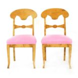 A pair of Biedermeier satinwood side chairs