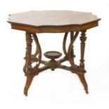 A rosewood centre table by Jas. Shoolbred and Co.,