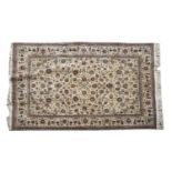 A Nain-style Persian cream ground rug,