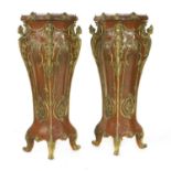 A pair of Louis XVI-style pedestals,