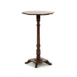 A George IV solid yew wood occasional table