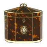 A George III tortoiseshell single compartment tea caddy