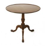 A George III mahogany dish-topped supper table,
