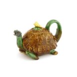 A Minton Majolica tortoise teapot and cover