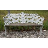 A Coalbrookdale-style cast iron garden seat,