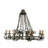 A pair of wrought iron strapwork eight-light electroliers,