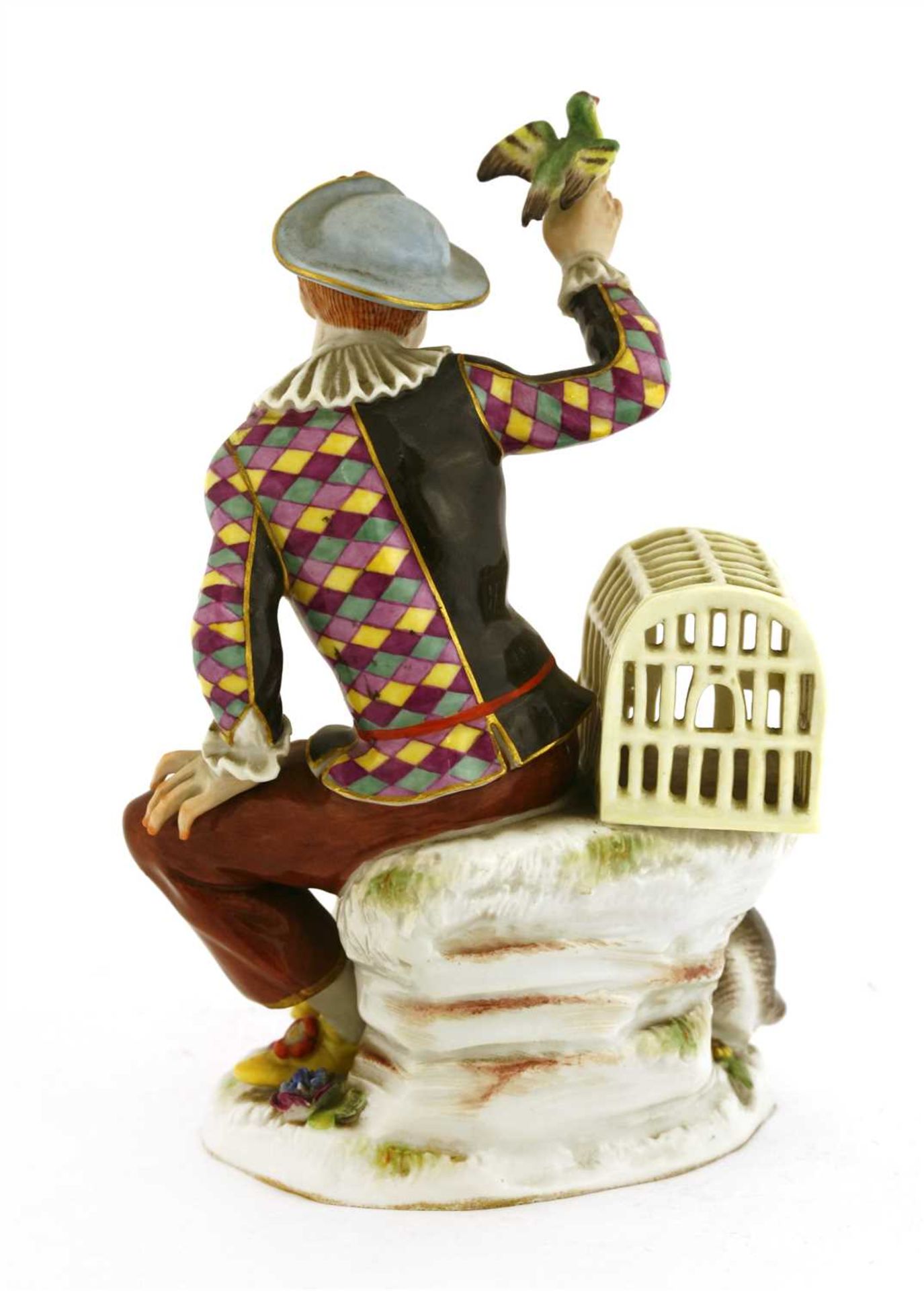 A Meissen figure of a seated harlequin - Image 2 of 2