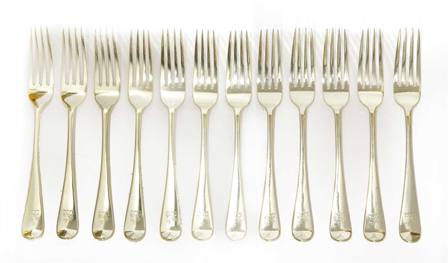 A set of twelve Victorian silver old English pattern table forks,