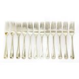 A set of twelve Victorian silver old English pattern table forks,
