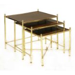 A nest of three brass and mahogany inset tables,