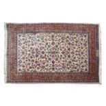 A Persian cream ground carpet,