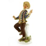 A Meissen figure of an harlequin,