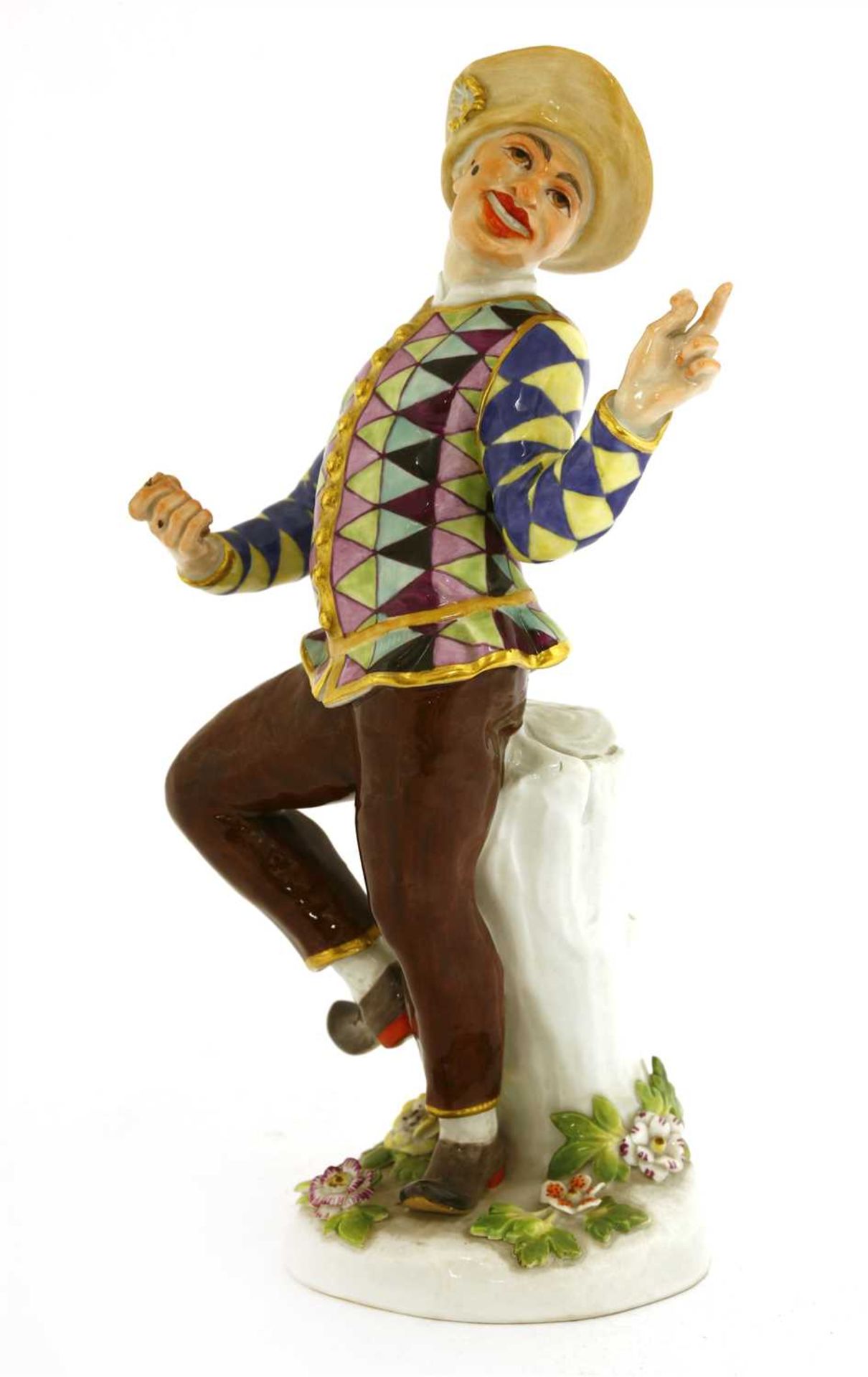 A Meissen figure of an harlequin,