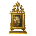 A carved giltwood table frame,