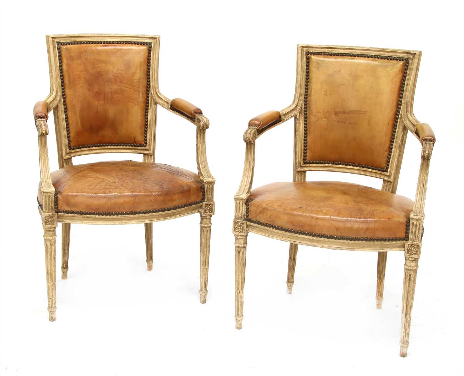 A pair of Louis XVI-style elbow chairs,