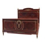 A French mahogany double bed,