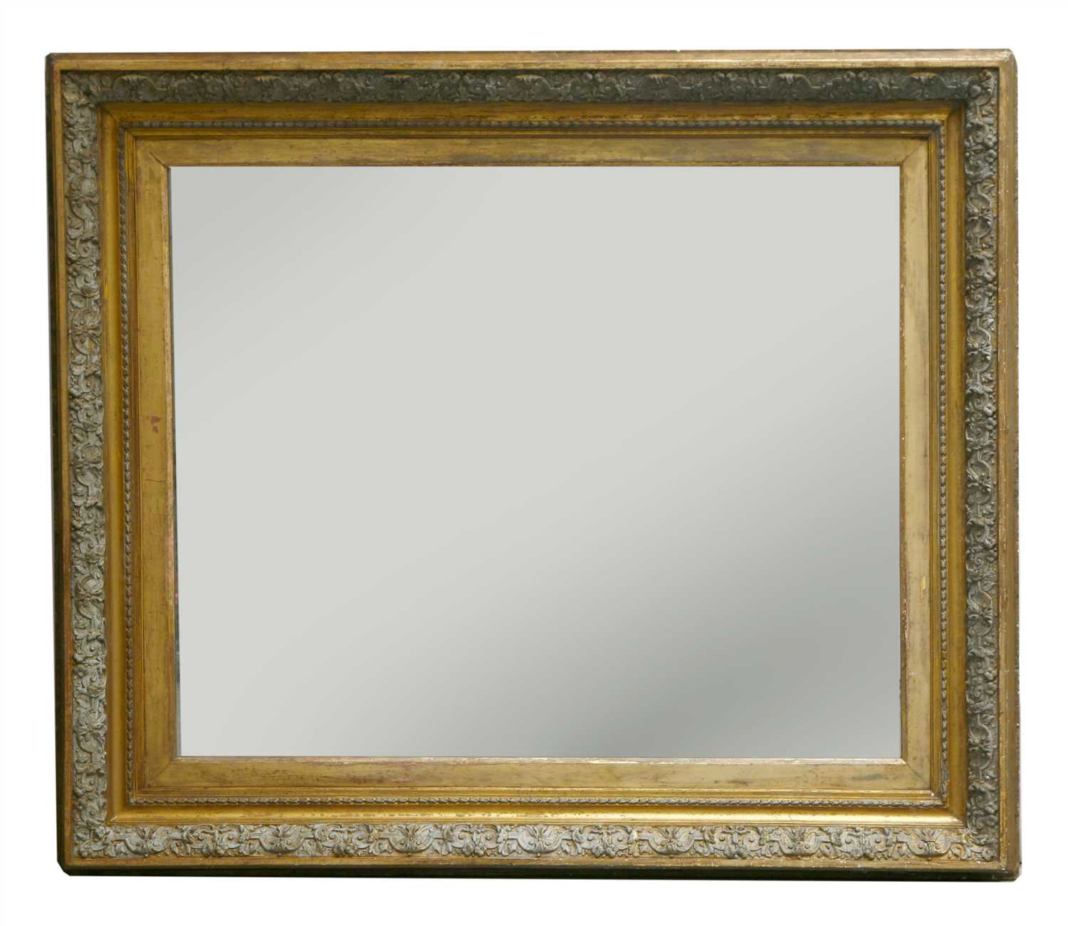 A large Victorian gilt and painted gesso wall mirror,