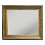 A large Victorian gilt and painted gesso wall mirror,