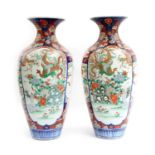 A pair of Imari baluster vases,