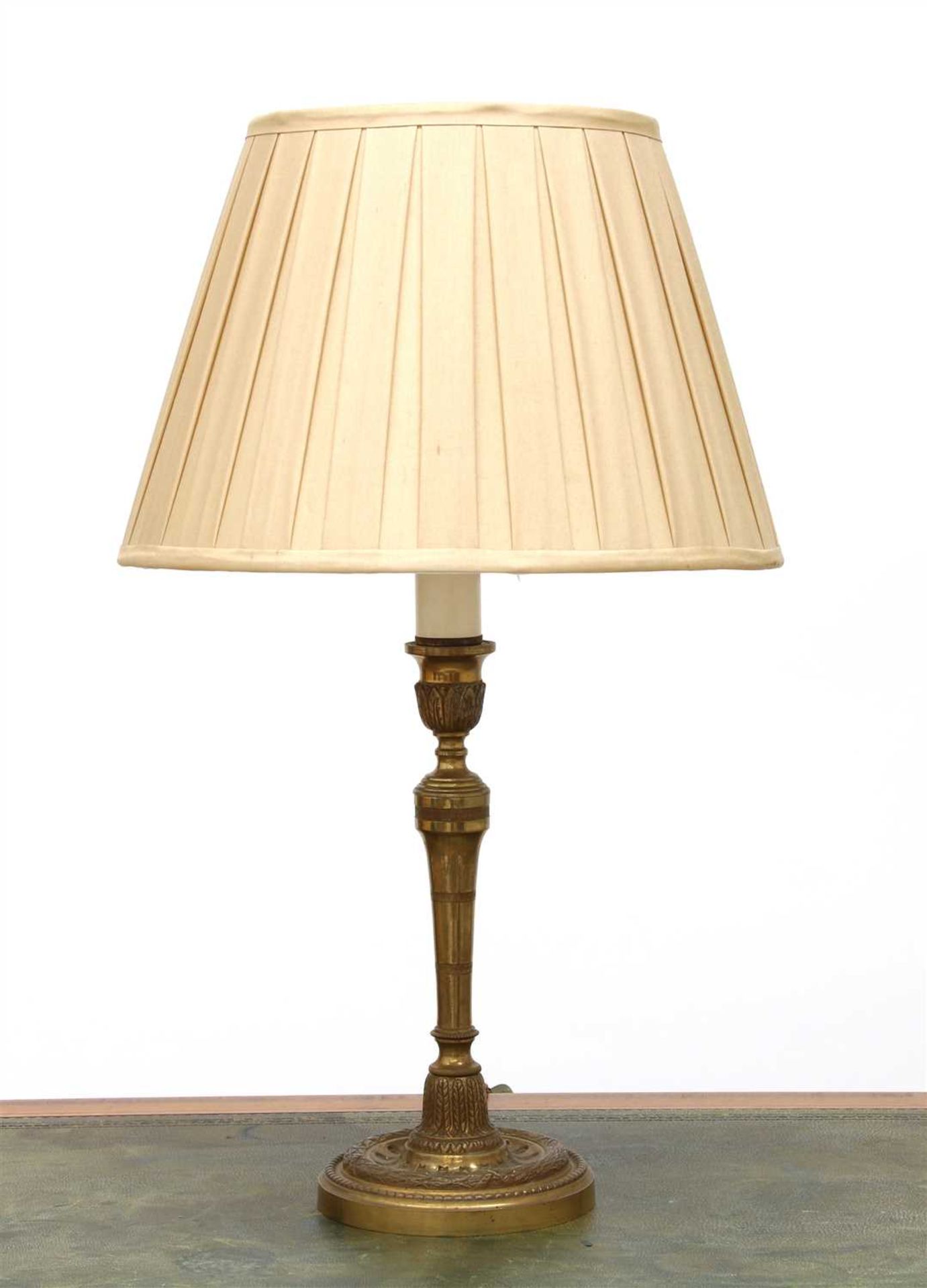 A brass candlestick table lamp,