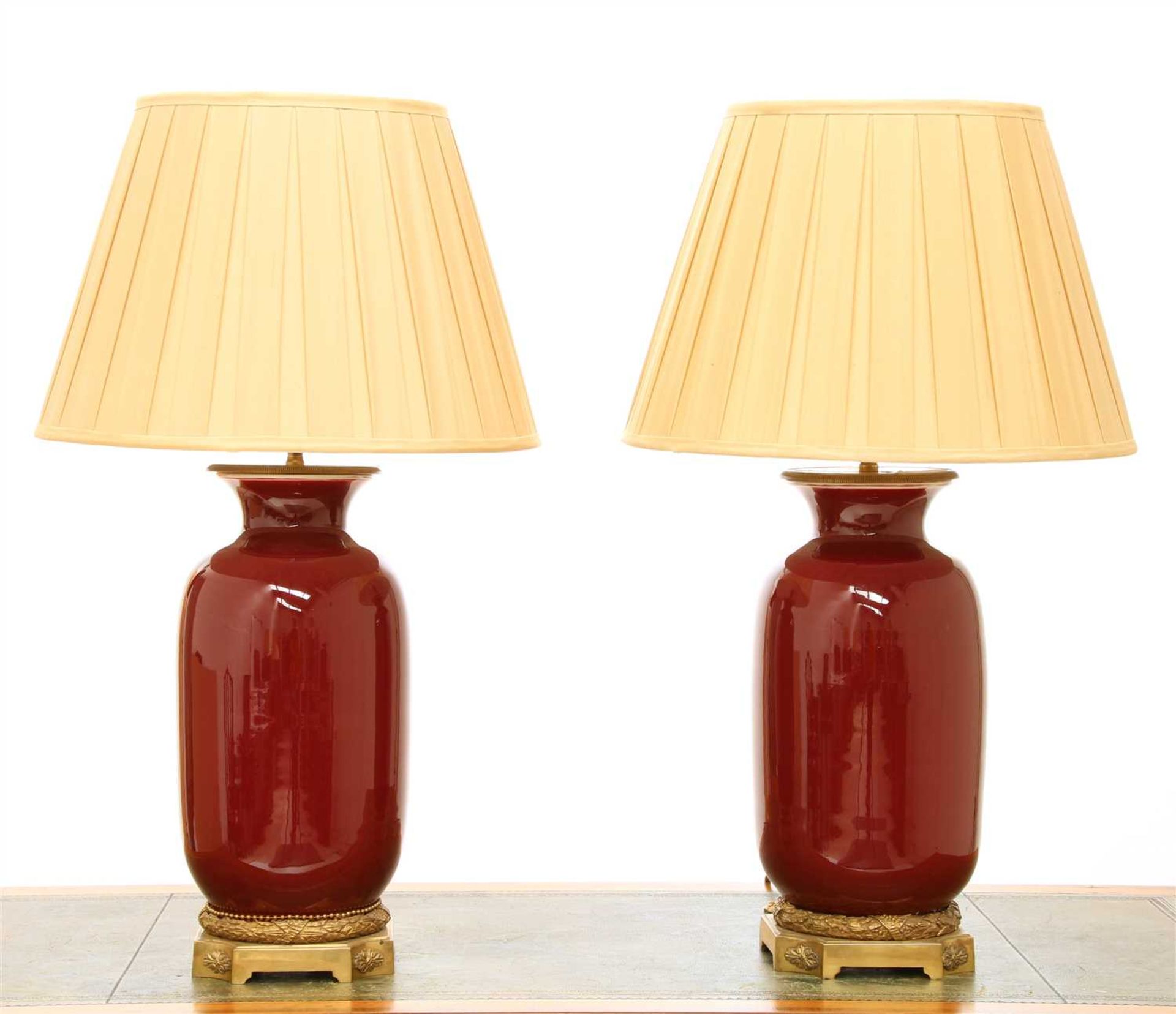 Two similar modern sang-de-boeuf vase table lamps,