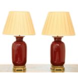 Two similar modern sang-de-boeuf vase table lamps,