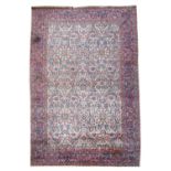 A large Kirman carpet,