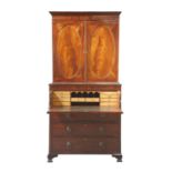 A George III strung mahogany secretaire bookcase,