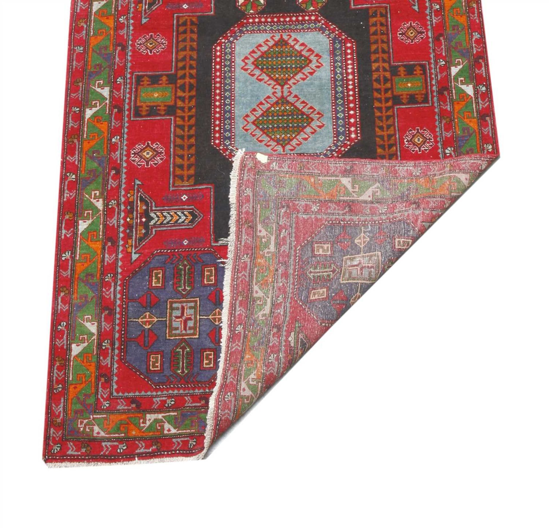 A Caucasian rug, - Image 2 of 2