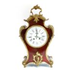 A French tortoiseshell and gilt bronze mantel clock,