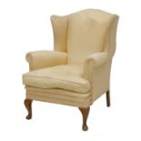 A wing armchair,